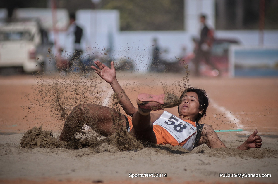 Long jump athlete Keshari Chaudhari in action during the 6th National Games held in Dhangadi, Kailali.  Photo: Bijay Gajmer 