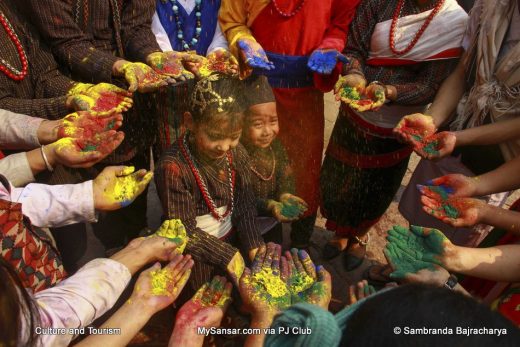 people of different ethnic groups celebrating the festival of colors, Holi.