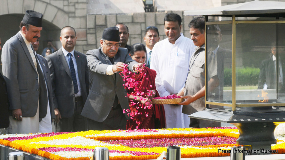 The Prime Minister of Nepal, Mr. Pushpa Kamal Dahal paying floral tributes at the Samadhi of Mahatma Gandhi, at Rajghat, in Delhi on September 16, 2016.